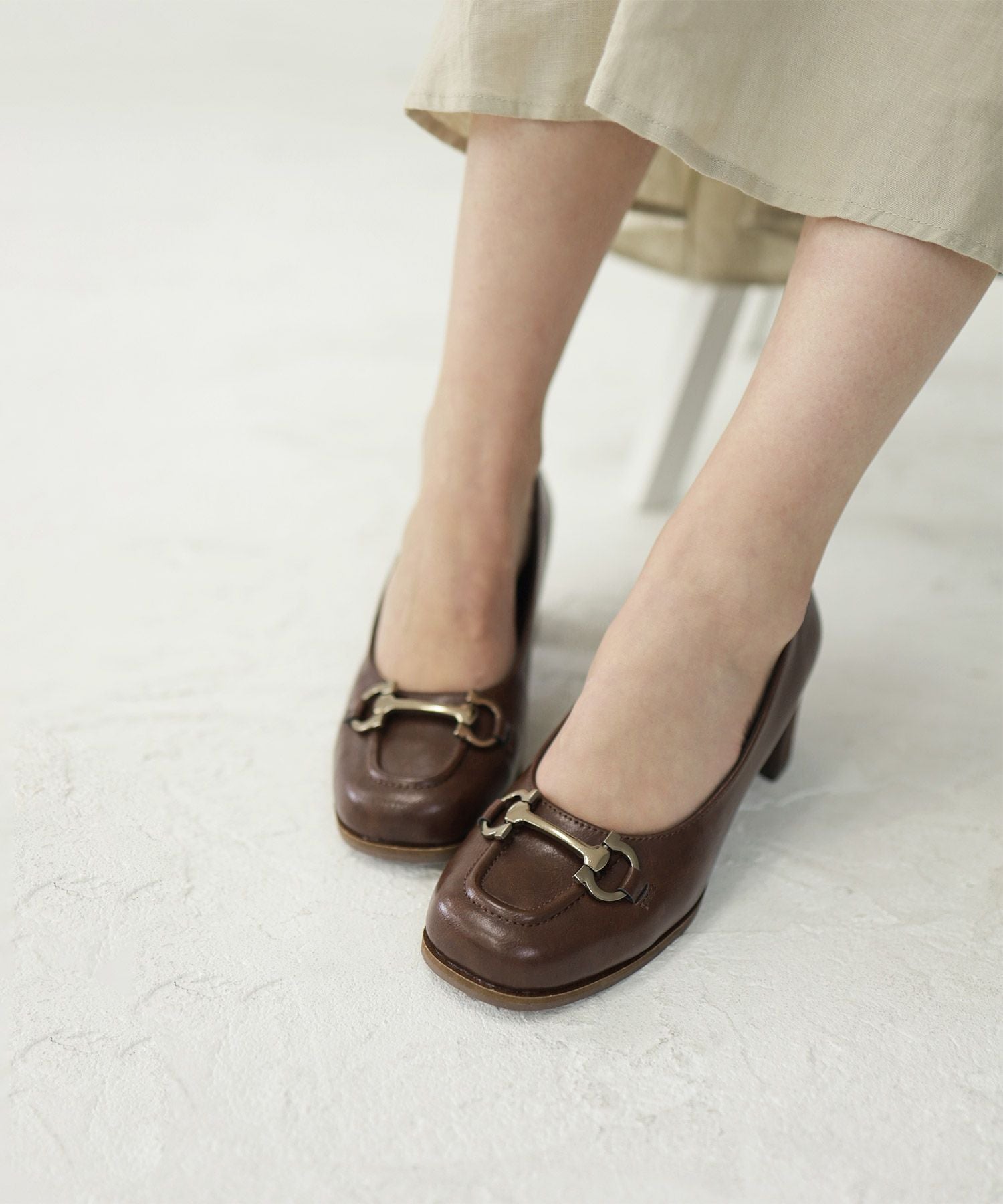 ビット付きフレアヒールパンプス▲返品交換不可